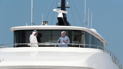 Saeed Mohammed Hareb, Secretary General of Dubai Sports Council ( right ) at the Dubai International Boat Show held in Dubai. Pawan Singh / The National
