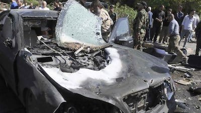 The bomb in the West Mezzeh area of Damascus exploded as Mr Al Halqi’s convoy passed by.