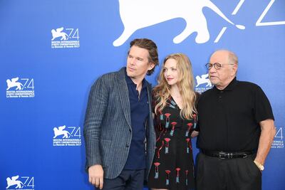 From left, Ethan Hawke, Amanda Seyfried and director Paul Schrader. WireImage