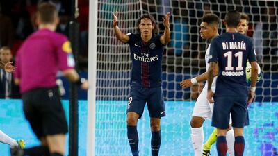 Paris Saint-Germain forward Edinson Cavani, centre, gestures during the French Ligue 1 match against Metz on Sunday, August 21, 2016 at the Parc des Princes in Paris. (Matthieu Alexandre/AFP)
