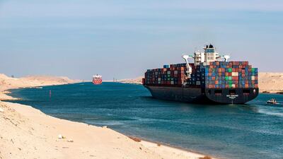 The Liberia-flagged container ship RDO Concord sailing through Egypt's Suez Canal near Ismailia on the 150th anniversary of the canal's inauguration. AFP