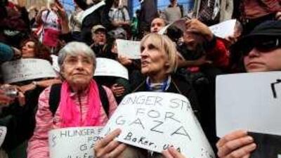 Hedy Epstein, 85, left, a US activist and Holocaust survivor, protests over Egypt's blockade of Gaza in Cairo yesterday.