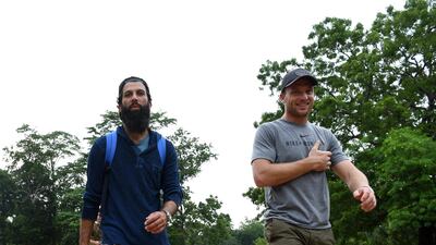 England cricketers Jos Buttler (R), Moeen Ali walk from the 80-metre ancient rock fortress of Sigiriya in north-central Sri Lanka. The Sigiriya rock, 160 kilometres north of Colombo, is a World Heritage site known for frescoes of bare-chested women. AFP