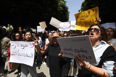 People join Tunisian lawyers in front of the courthouse in Tunis on May 16, as they demonstrate against the country's President. AFP