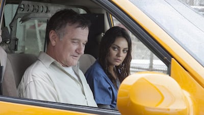 A handout movie still shoiwng Henry Altmann (Robin Williams) and Sharon Gill (Mila Kunis) in THE ANGRIEST MAN IN BROOKLYN. (Photo by Jojo Whilden)