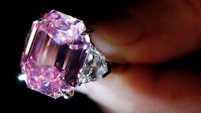 The pink diamond fetchd $50 million (Dh183.6m), setting a record for a stone of its kind. Reuters