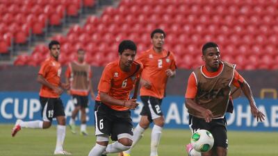 The UAE U17 team train on the pitch at the Mohammed bin Zayed stadium. Only a win and other results going their way will be enough for them to qualify for the last 16 of the World Cup. Ravindranath K / The National