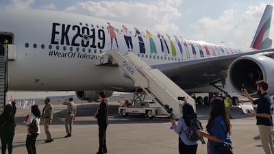 The plane, carrying more than 500 passengers, flew over all seven emirates at low altitude, allowing those on the ground to watch the aircraft. Patrick Ryan / The National