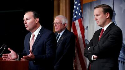 Senators Mike Lee (R-UT), Bernie Sanders (I-VT) and Chris Murphy (D-CT) speak after the senate voted on a resolution ending US military support for the war in Yemen on Capitol Hill in Washington. Reuters