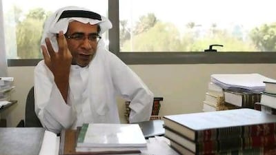 The Emirati poet Ahmed Rashed Thani at the Adach office in Abu Dhabi.