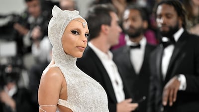 Doja Cat arrives Met Gala dressed as Choupette, Karl Lagerfeld's famous cat. AP