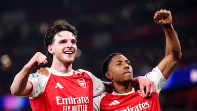 Arsenal's Declan Rice and Myles Lewis-Skelly celebrate at the Emirates Stadium after reaching the Champions League final. PA