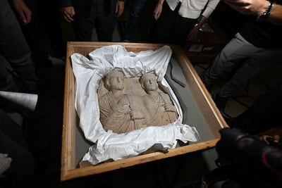 A Palmyrene funerary scene dating back to the 2nd–3rd century AD. AFP