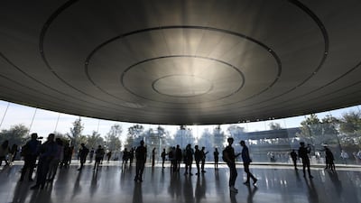 Attendees arrive for an Apple event at the Steve Jobs Theatre in Cupertino, California. Bloomberg