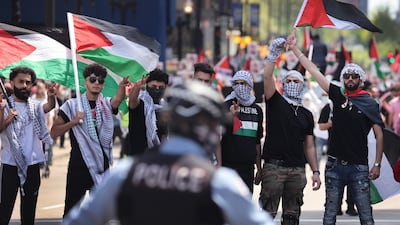 People in Chicago, Illinois, protest against the Israeli air strikes in the Gaza Strip. AFP