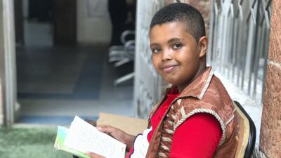 Josef, a 10-year-old Ethiopian refugee in Yemen, studies at a UNHCR-supported community centre in the capital Sanaa. Courtesy UNHCR