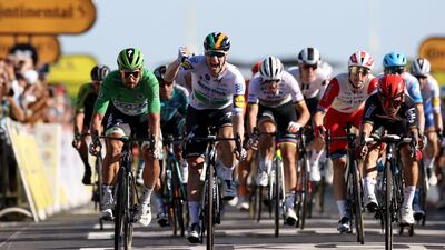 Deceuninck-Quick Step rider Sam Bennett celebrates after winning Stage 10 of the Tour de France on Tuesday, September 8. Reuters