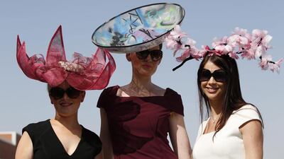 Female spectators during a hat presentation. Ali Haider / EPA