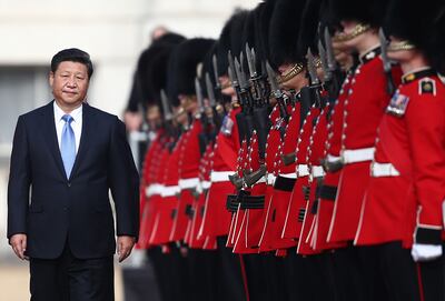 Xi Jinping inspects a guard of honour in London in 2015. Getty Images