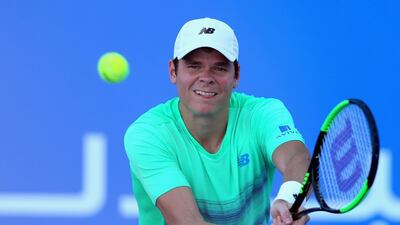 Milos Raonic in action against Andy Murray during the play-off match for third place of the Mubadala World Tennis Championship in Abu Dhabi on December 31, 2016. Francois Nel / Getty Images