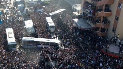 A throng of people gathering outside Nasser Hospital as they welcome Palestinians released from Israeli jails, in Khan Younis, southern Gaza. Reuters