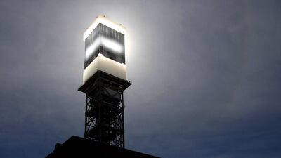 Concentrated solar power uses mirrors to heat a tower of salt, which can then produce energy for up to 12 hours. Ethan Miller / AFP