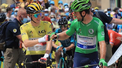 Tadej Pogacar and Mark Cavendish at the start of Stage 14.