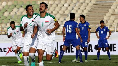 Mohannad Abdulraheem, centre, scored all four goals in Iraq's 4-0 2018 World Cup qualifying win against Thailand. Stringer / AFP