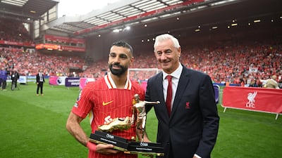Mohamed Salah with the Premier League Golden Boot trophy. Getty Images