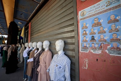 A campaign poster in Deir Al Balah shows candidates for the upcoming municipal elections. AFP