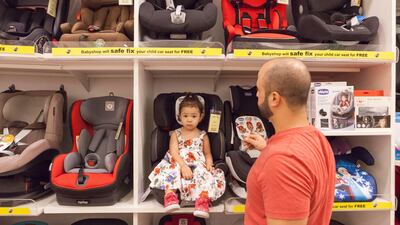 Car seat purchases have went through the roof since a law ensuring kids under 4 buckle up in the back came into force recently. Antonie Robertson / The National