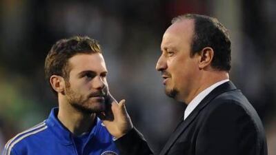 Rafael Benitez, right, speaking here with Juan Mata, will take his Chelsea team to Liverpool where his family is based. Steve Bardens / Getty Images