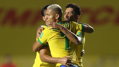 Roberto Firmino celebrates. Getty