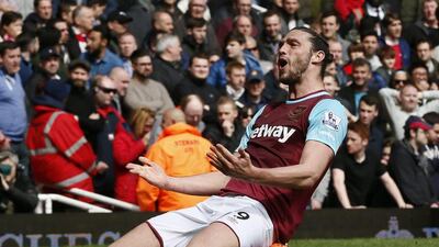 Andy Carroll's hat-trick against Arsenal provided a timely reminder of his ability ahead of the FA Cup tie against Manchester United. Stefan Wermuth / Reuters
