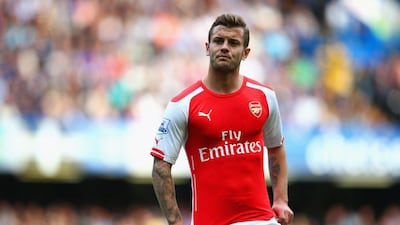 Jack Wilshere of Arsenal looks on during his side's Premier League loss to Chelsea on Sunday at Stamford Bridge in London. Paul Gilham / Getty Images / October 5, 2014