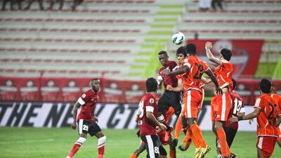 Al Ahli and Ajman clash on a corner kick. Lee Hoagland/The National