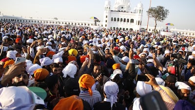 Sikh pilgrims at the shrine of Baba Guru Nanak at Gurduwara Darbar Sahib during the opening of the Kartarpur Corridor in Kartarpur, Pakistan on November 9. Sohail Shahzad / EPA