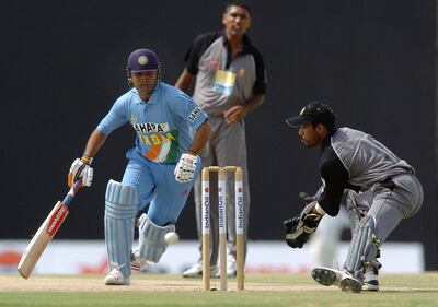 Ali Asad looks on in the background as India batter Virender Sehwag is ran out for a duck during the 2004 Asia Cup match against the UAE in Dambulla. AFP