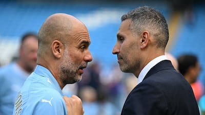 Khaldoon Al Mubarak and Pep Guardiola oversaw Manchester City's fourth straight Premier League title win. AFP
