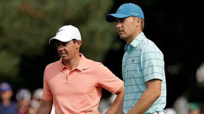 Jordan Spieth, right, and Rory McIlroy are both close to winning a career grand slam. Tony Dejak / AP Photo