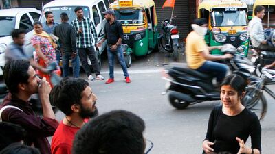 Pooja Saxena leading a Type Walks: she looks at the extraordinary range of signs and fonts that illuminate New Delhi on a unique typography tour. Photo: Supplied