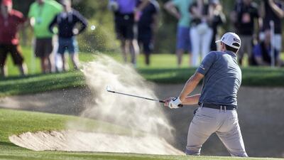 Patrick Cantlay on the bunker of the 15th hole. Victor Besa / The National