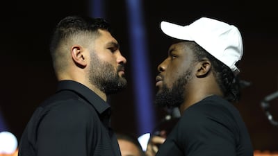 Filip Hrgovic, left, and David Adeleye face off. Getty Images