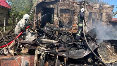 Firefighters work at a scene of a missile strike, as the Russian invasion of Ukraine continues, in Zatoka, Odesa region. Reuters