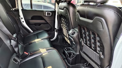 The seats are heavily bolstered, but are at a height that requires you to hoist yourself up using support