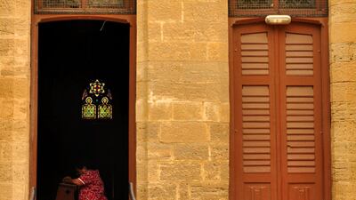 A woman praying inside the St. Andrew's Presbyterian Church in Karachi. Mobeen Ansari