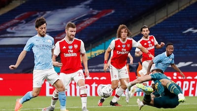 ARSENAL RATINGS: Emiliano Martinez - 7: Looked really solid once again between the sticks for Arsenal. Reuters