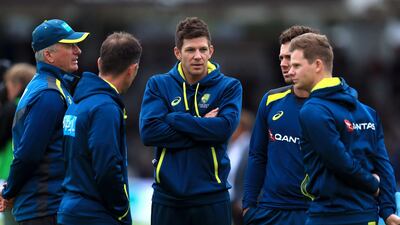 Australia’s captain Tim Paine, centre, and the rest of the team inspect the pitch. Mike Egerton / PA Wire