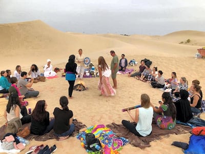 A cacao ceremony led by Lara Skadsen, a vibrational energy practitioner from Abu Dhabi, during which liquid cacao is consumed while participants share stories. Courtesy Lara Skadsen