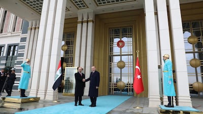 President of Turkey Recep Tayyip Erdogan, right, welcomes Iraqi President Barham Salih, left, with an official ceremony at the Presidential Complex in Ankara. AFP